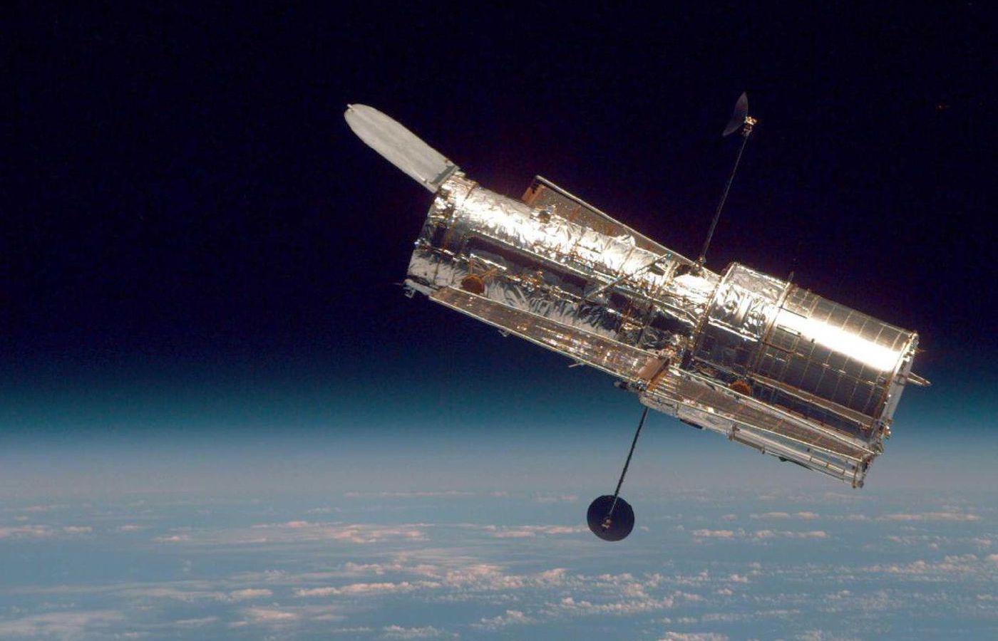 The Hubble photographed by the Space Shuttle Discovery.  Credits: NASA.